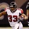 NEW ORLEANS - NOVEMBER 2: Running back Michael Turner #33 of the Atlanta Falcons runs with the ball against the New Orleans Saints during the first quarter of the game at the Louisiana Superdome on November 2, 2009 in New Orleans, Louisiana. (Photo by Chris Graythen/Getty Images)