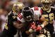 NEW ORLEANS - NOVEMBER 2:  Tony Gonzalez #88 of the Atlanta Falcons makes a first down then is stopped by Jonathan Vilma #51 and Darren Sharper #42 of the New Orleans Saints during the fourth quarter of the game at the Louisiana Superdome on November 2, 2009 in New Orleans, Louisiana. (Photo by Chris Graythen/Getty Images)