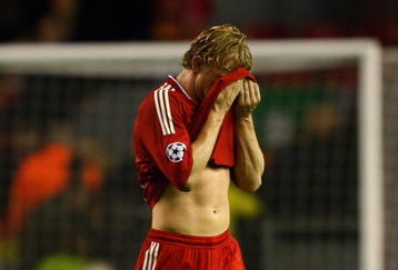 LIVERPOOL, ENGLAND - OCTOBER 20:  Dirk Kuyt of Liverpool shows his dejection at the final whistle during the UEFA Champions League Group E match between Liverpool and Lyon at Anfield on October 20, 2009 in Liverpool, England.  (Photo by Clive Brunskill/Getty Images)