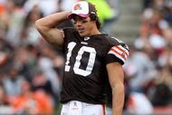 CLEVELAND - OCTOBER 04: Brady Quinn #10 of the Cleveland Browns looks on against the Cincinnati Bengals during their game at Cleveland Browns Stadium on October 4, 2009 in Cleveland, Ohio. The Bengals defeated the Browns 23-20 in overtime. (Photo by Jim McIsaac/Getty Images)