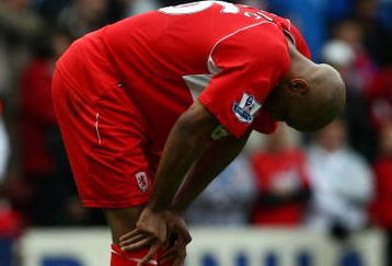 MIDDLESBROUGH, ENGLAND - MAY 16:  Marlon King of Middlesbrough looks rejected at the final whistle during the Barclays Premier League match between Middlesbrough and Aston Villa at the Riverside Stadium on May 16, 2009 in Middlesbrough, England.  (Photo by Clive Rose/Getty Images)