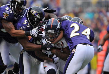 BALTIMORE - NOVEMBER 1:  Brandon Marshall #15 of the Denver Broncos runs the ball against the Baltimore Ravens at M&T Bank Stadium on November 1, 2009 in Baltimore, Maryland. (Photo by Larry French/Getty Images)