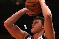 NEW YORK - OCTOBER 31: Danilo Gallinari #8 of the New York Knicks shoots against the Philadelphia 76ers at Madison Square Garden on October 31, 2009 in New York City. The 76ers defeated the Knicks 141-127. NOTE TO USER: User expressly acknowledges and agrees that, by downloading and or using this photograph, User is consenting to the terms and conditions of the Getty Images License Agreement. (Photo by Chris Trotman/Getty Images)