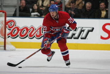 TORONTO, ON - NOVEMBER 13:  Bryan Smolinski #20 of the Montreal Canadiens skates with the puck against the Toronto Maple Leafs on November 13, 2007 at the Air Canada Centre in Toronto, Ontario, Canada. (Photo by Bruce Bennett/Getty Images)
