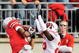 COLUMBUS, OH - OCTOBER 10: DeVier Posey #8 of the Ohio State Buckeyes pulls in a 32-yard touchdown pass in front of Antonio Fenelus #26 of the Wisconsin Badgers at Ohio Stadium on October 10, 2009 in Columbus, Ohio. (Photo by Jamie Sabau/Getty Images)