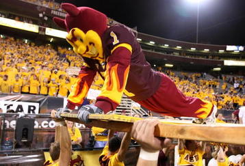 TEMPE, AZ - OCTOBER 13:  'Sparky' the Arizona State Sun Devils mascot does pushups in front of the student section after a Sun Devils' touchdown against the Washington Huskies on Ocotber 13, 2007 at Sun Devil Stadium in Tempe, Arizona.  Arizona State won 44-20.  (Photo by Stephen Dunn/Getty Images)