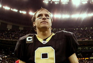 NEW ORLEANS - NOVEMBER 2:  Quarterback Drew Brees #9 of the New Orleans Saints leaves the field after leading his team to a 35-27 victory over the Atlanta Falcons in the game at the Louisiana Superdome on November 2, 2009 in New Orleans, Louisiana. (Photo by Chris Graythen/Getty Images)