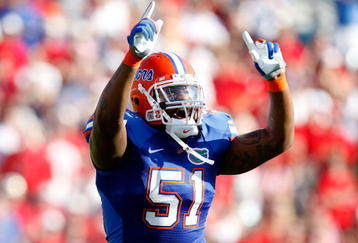 JACKSONVILLE, FL - OCTOBER 31:  Brandon Spikes #51 of the Florida Gators calls the defense against the Georgia Bulldogs at Jacksonville Municipal Stadium on October 31, 2009 in Jacksonville, Florida.  (Photo by Kevin C. Cox/Getty Images)