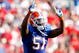 JACKSONVILLE, FL - OCTOBER 31:  Brandon Spikes #51 of the Florida Gators calls the defense against the Georgia Bulldogs at Jacksonville Municipal Stadium on October 31, 2009 in Jacksonville, Florida.  (Photo by Kevin C. Cox/Getty Images)