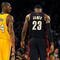 LOS ANGELES, CA - JANUARY 19:  Kobe Bryant #24 of the Los Angeles Lakers walks next to LeBron James #23 of the Cleveland Cavaliers during a break from the game at Staples Center on January 19, 2009 in Los Angeles, California.  (Photo by Harry How/Getty Images)