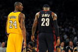 LOS ANGELES, CA - JANUARY 19:  Kobe Bryant #24 of the Los Angeles Lakers walks next to LeBron James #23 of the Cleveland Cavaliers during a break from the game at Staples Center on January 19, 2009 in Los Angeles, California.  (Photo by Harry How/Getty Images)