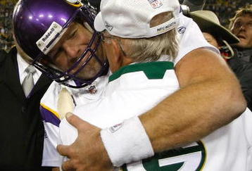 GREEN BAY, WI - NOVEMBER 1: Quarterback Brett Favre #4 of the Minnesota Vikings hugs a Packers coach after the game against the Green Bay Packers at Lambeau Field on November 1, 2009 in Green Bay, Wisconsin. The Vikings defeated the Packers 38-26. (Photo by Scott Boehm/Getty Images)