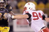 COLUMBIA, MO - OCTOBER 08:  Derrick Washington #2 of the Missouri Tigers carries the ball against Jared Crick #94 of the Nebraska Cornhuskers on October 8, 2009 at Faurot Field/Memorial Stadium in Columbia, Missouri. (Photo by Jamie Squire/Getty Images)