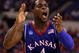 INDIANAPOLIS - MARCH 27: Sherron Collins #4 of the Kansas Jayhawks reacts in the first half against the Michigan State Spartans during the third round of the NCAA Division I Men's Basketball Tournament at the Lucas Oil Stadium on March 27, 2009 in Indianapolis, Indiana. (Photo by Andy Lyons/Getty Images)