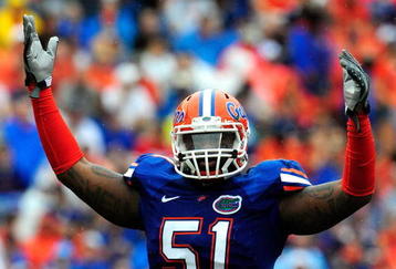 GAINESVILLE, FL - SEPTEMBER 12:  Brandon Spikes #51 of the Florida Gators reacts during the game against the Troy Trojans at Ben Hill Griffin Stadium on September 12, 2009 in Gainesville, Florida.  (Photo by Sam Greenwood/Getty Images)