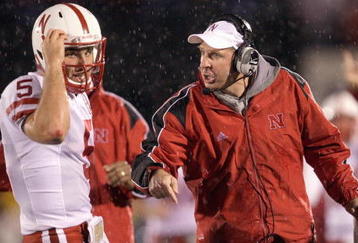 COLUMBIA, MO - OCTOBER 08:  Quarterback Zac Lee #5 of the Nebraska Cornhuskers listens to head coach Bo Pelini during the game against the Missouri Tigers on October 8, 2009 at Faurot Field/Memorial Stadium in Columbia, Missouri. (Photo by Jamie Squire/Getty Images)