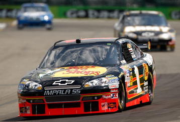WATKINS GLEN, NY - AUGUST 07:  Martin Truex Jr. drives the #1 Bass Pro Shops Chevrolet during practice for the NASCAR Sprint Cup Series Heluva Good! Sour Cream Dips at Watkins Glen International on August 7, 2009 in Watkins Glen, New York.  (Photo by Chris Graythen/Getty Images)