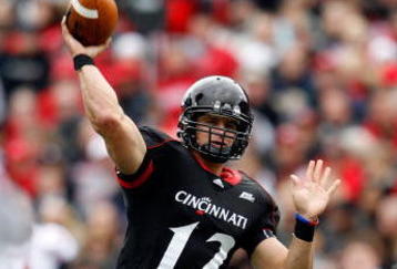 CINCINNATI - OCTOBER 24:  Zach Collaros #12 of the Cincinnati Bearcats throws the ball during the Big East Conference game against the Louisville Cardinals at Nippert Stadium on October 24, 2009 in Cincinnati, Ohio.  (Photo by Andy Lyons/Getty Images)