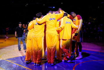LOS ANGELES, CA - OCTOBER 30: Los Angeles Lakers huddle before the start of their NBA basketball game against the Dallas Mavericks at Staples Center on October 30, 2009 in Los Angeles, California.  NOTE TO USER: User expressly acknowledges and agrees that, by downloading and/or using this Photograph, user is consenting to the terms and conditions of the Getty Images License Agreement.  (Photo by Kevork Djansezian/Getty Images)