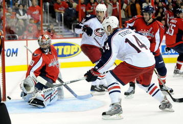 WASHINGTON - NOVEMBER 01:  Raffi Torres #14 of the Columbus Blue Jackets scores his second goal of the third period against Jose Theodore #60 of the Washington Capitals at the Verizon Center on November 1, 2009 in Washington, DC. Columbus won the game 5-4.  (Photo by Greg Fiume/Getty Images)