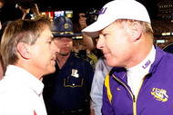 BATON ROUGE, LA - NOVEMBER 08: Head Coach Nick Saban of the Alabama Crimson Tide is congratulated by head coach Les Miles of the Louisiana State University Tigers after the Tide defeated the Tigers 27-21 in overtime on November 11, 2008 at Tiger Stadium in Baton Rouge, Louisiana. (Photo by Chris Graythen/Getty Images)
