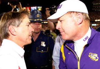 BATON ROUGE, LA - NOVEMBER 08:  Head Coach Nick Saban of the Alabama Crimson Tide is congratulated by head coach Les Miles of the Louisiana State University Tigers after the Tide defeated the Tigers 27-21 in overtime on November 11, 2008 at Tiger Stadium in Baton Rouge, Louisiana.  (Photo by Chris Graythen/Getty Images)