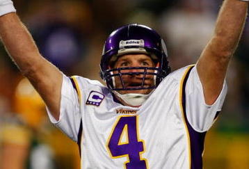 GREEN BAY, WI - NOVEMBER 01: Quarterback Brett Favre #4 of the Minnesota Vikings celebrates a touchdown by teammate Percy Harvin #12 after a 51 yard touchdown pass during the third quarter of the game against the Green Bay Packers at Lambeau Field on November 1, 2009 in Green Bay, Wisconsin. (Photo by Scott Boehm/Getty Images)