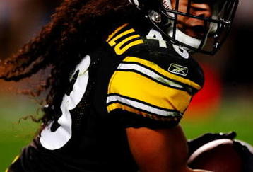 PITTSBURGH - SEPTEMBER 10:  Troy Polamalu #43 of the Pittsburgh Steelers runs with the ball against the Tennessee Titans during the game at Heinz Field on September 10, 2009 in Pittsburgh, Pennsylvania. (Photo by Scott Boehm/Getty Images)