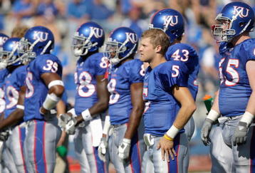 LAWRENCE, KS - SEPTEMBER 19:  Todd Reesing #5 of the Kansas Jayhawks stands onto the field before the game against the Duke Blue Devils on Kivisto Field at Memorial Stadium on September 19, 2009 in Lawrence, Kansas. (Photo by Jamie Squire/Getty Images)