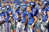 LAWRENCE, KS - SEPTEMBER 19:  Todd Reesing #5 of the Kansas Jayhawks stands onto the field before the game against the Duke Blue Devils on Kivisto Field at Memorial Stadium on September 19, 2009 in Lawrence, Kansas. (Photo by Jamie Squire/Getty Images)