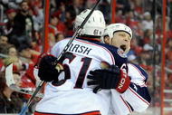 WASHINGTON - NOVEMBER 01:  Raffi Torres #14 of the Columbus Blue Jackets celebrates with Rick Nash #61 after scoring his second goal of the third period against the Washington Capitals at the Verizon Center on November 1, 2009 in Washington, DC. Columbus won the game 5-4.  (Photo by Greg Fiume/Getty Images)