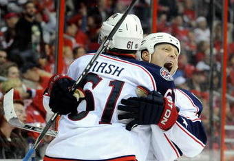 WASHINGTON - NOVEMBER 01:  Raffi Torres #14 of the Columbus Blue Jackets celebrates with Rick Nash #61 after scoring his second goal of the third period against the Washington Capitals at the Verizon Center on November 1, 2009 in Washington, DC. Columbus won the game 5-4.  (Photo by Greg Fiume/Getty Images)