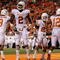 STILLWATER, OK - OCTOBER 31:  Earl Thomas #12 Sergio Kindle #2 of the Texas Longhorns celebrates a touchdown scored by teammate Earl Thomas #12 (R) on an interception in the third quarter against the Oklahoma State Cowboys at Boone Pickens Stadium on October 31, 2009 in Stillwater, Oklahoma.  (Photo by Ronald Martinez/Getty Images)