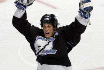 WASHINGTON - APRIL 15:  Vincent Lecavalier #4 of the Tampa Bay Lightning celebrates with Dan Boyle #22 after Lecavalier scored the game winning goal in overtime against the Washington Capitals in game three of the first round of the 2003 Eastern Conference Stanley Cup playoffs at the MCI Center on April 15, 2003 in Washington, DC. The Lightning defeated the Capitals 4-3 in overtime. (Photo by Doug Pensinger/Getty Images/NHLI) 