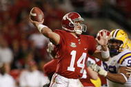 TUSCALOOSA, AL - NOVEMBER 03:  John Parker Wilson #14 of the Alabama Crimson Tide throws a touchdown pass against the LSU Tigers at Bryant-Denny Stadium on November 3, 2007 in Tuscaloosa, Alabama. LSU defeated Alabama 41-34.  (Photo by Doug Benc/Getty Images)