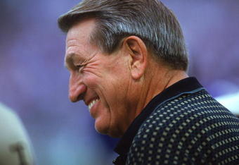 BALTIMORE - SEPTEMBER 24:  A close up of Hall of Fame Quarterback Johnny Unitas, formerly of the Baltimore Colts, as he smiles and looks on during the game between the Cincinnati Bengals and the Baltimore Ravens on September 24, 2000 at PSINet Stadium in Baltimore, Maryland. The Ravens defeated the Bengals 37-0.  (Photo By David Leeds/Getty Images)