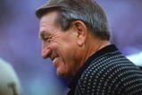 BALTIMORE - SEPTEMBER 24:  A close up of Hall of Fame Quarterback Johnny Unitas, formerly of the Baltimore Colts, as he smiles and looks on during the game between the Cincinnati Bengals and the Baltimore Ravens on September 24, 2000 at PSINet Stadium in Baltimore, Maryland. The Ravens defeated the Bengals 37-0.  (Photo By David Leeds/Getty Images)