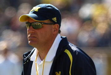 ANN ARBOR, MI - SEPTEMBER 19:  Head coach Rich Rodriguez of the Michigan Wolverines watches warmups before the game with the Eastern Michigan Eagles at Michigan Stadium on September 19, 2009 in Ann Arbor, Michigan.  Michigan won 45-17.  (Photo by Stephen Dunn/Getty Images)
