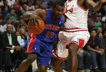 CHICAGO - MARCH 24: Will Bynum #12 of the Detroit Pistons drives around Tim Thomas #2 of the Chicago Bulls on March 24, 2009 at the United Center in Chicago, Illinois. The Bulls defeated the Pistons 99-91. NOTE TO USER: User expressly acknowledges and agreees that, by downloading and/or using this Photograph, User is consenting to the terms and conditions of the Getty Images License Agreement. (Photo by Jonathan Daniel/Getty Images)