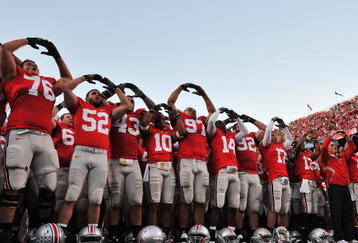 COLUMBUS, OH - OCTOBER 10:  The Ohio State Buckeyes sing their alma mater, Carmen Ohio, after defeating the Wisconsin Badgers 31-13 at Ohio Stadium on October 10, 2009 in Columbus, Ohio.  (Photo by Jamie Sabau/Getty Images)