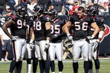 HOUSTON - OCTOBER 25:  Linebacker Brian Cushing #56 of the Houston Texans takes a break along with defensive end Connor Barwin #98 and Antonio Smith #94 during the game against the San Francisco 49ers at Reliant Stadium on October 25, 2009 in Houston, Texas.  (Photo by Bob Levey/Getty Images)