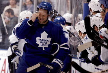 TORONTO - NOVEMBER 3:  Phil Kessel #81 of the Toronto Maple Leafs regroups after getting hit by Mattias Ohlund #5 of the Tampa Bay Lightning during a NHL game at the Air Canada Centre on November 3, 2009 in Toronto, Ontario, Canada .  (Photo by Abelimages/Getty Images)