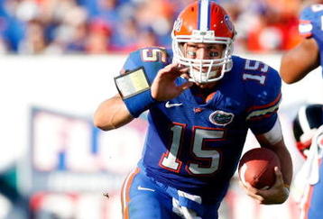 JACKSONVILLE, FL - OCTOBER 31:  Quarterback Tim Tebow #15 of the Florida Gators rushes upfield against the Georgia Bulldogs at Jacksonville Municipal Stadium on October 31, 2009 in Jacksonville, Florida.  (Photo by Kevin C. Cox/Getty Images)