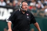 OAKLAND, CA - OCTOBER 18: Head coach Tom Cable of the Oakland Raiders looks on against the Philadelphia Eagles during an NFL game at the Oakland-Alameda County Coliseum on October 18, 2009 in Oakland, California.  (Photo by Jed Jacobsohn/Getty Images)