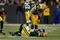 GREEN BAY, WI - NOVEMBER 1: Wide receiver Donald Driver #80 of  the Green Bay Packers lays on the field injured as guard T.J. lang #70 looks on against the Minnesota Vikings at Lambeau Field on November 1, 2009 in Green Bay, Wisconsin. The Vikings defeated the Packers 38-26. (Photo by Scott Boehm/Getty Images)