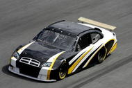 DAYTONA BEACH, FL - JANUARY 19:  NASCAR test driver Brett Bodine, drives the NASCAR car of tomorrow with a rear wing, during NASCAR Nextel Cup Series January Testing on January 19, 2006 at Daytona International Speedway in Daytona Beach, Florida.  (Photo by Rusty Jarrett/Getty Images)