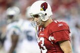 GLENDALE, AZ - NOVEMBER 01:  Quarterback Kurt Warner #13 of the Arizona Cardinals walks off the field after fumbling the ball during the fourth quarter of the NFL game against the Carolina Panthers at the Universtity of Phoenix Stadium on November 1, 2009 in Glendale, Arizona. The Panthers defeated the Cardinals 34-21.  (Photo by Christian Petersen/Getty Images)