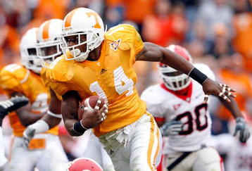 KNOXVILLE, TN - OCTOBER 10: Eric Berry #14 of the Tennessee Volunteers runs with the ball after intercepting a pass during the SEC game against the Georgia Bulldogs at Neyland Stadium on October 10, 2009 in Knoxville, Tennessee. (Photo by Andy Lyons/Getty Images)