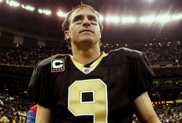 NEW ORLEANS - NOVEMBER 2:  Quarterback Drew Brees #9 of the New Orleans Saints leaves the field after leading his team to a 35-27 victory over the Atlanta Falcons in the game at the Louisiana Superdome on November 2, 2009 in New Orleans, Louisiana. (Photo by Chris Graythen/Getty Images)