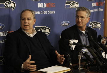 KIRKLAND, WA - FEBRUARY 06:  Team president Tim Ruskell (L) and CEO Tod Leiweke of the Seattle Seahawks address the media during a press conference announcing that Seahawks' assistant coach Jim Mora will take over as head coach in the 2009 season, on February 6, 2008 at Seahawks Headquarters in Kirkland, Washington. Holmgren will coach the team in 2008.  (Photo by Otto Greule Jr/Getty Images)